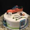 16" 3 Layer Vanilla Pound Cake
Vanilla ButterCream Filling/Frosting
Decorations:
Running Shoe (Rice Krispies)
Fondant/Gumpaste Watch, Water Bottle, Ipod, Head Phones, Band, etc