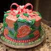 Lilly Pulitzer inspired "Hotty Pink" Birthday Cake.  This is a 3 layer Marble Cake with Raspberry Mouse Filling and Butercream Frosting.  The Decoration is Hand Painted Flowers on Fondant. 