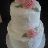 This is an elegant May Wedding Cake.  It is done in a rough-coating technique. 